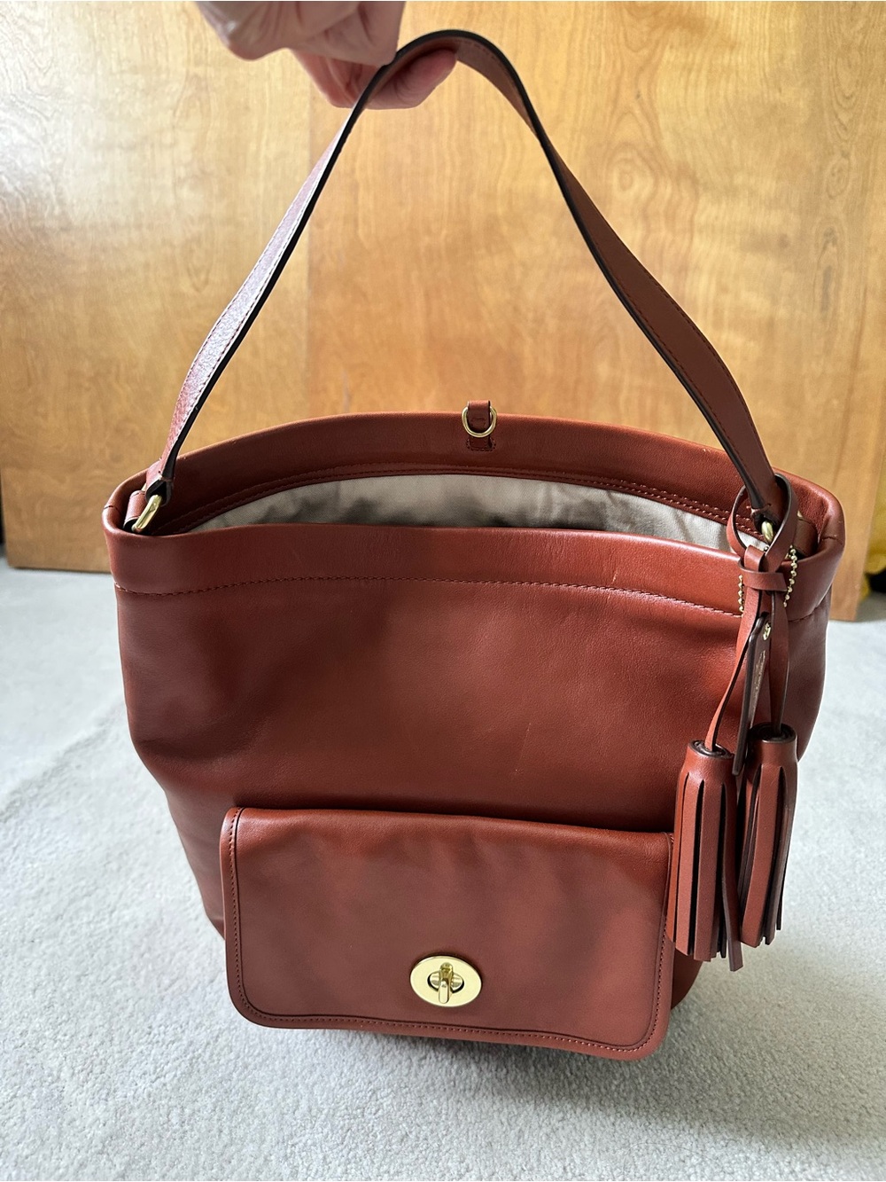 Coach Leather Shoulder bucket bag in Rust Brown with Tassel Detail